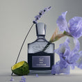 Load image into Gallery viewer, Iris Debonair by Creed, bottle with raw materials
