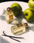 Load image into Gallery viewer, La Danza delle Libellule by Nobile 1942, bottle and box in a lifestyle setting

